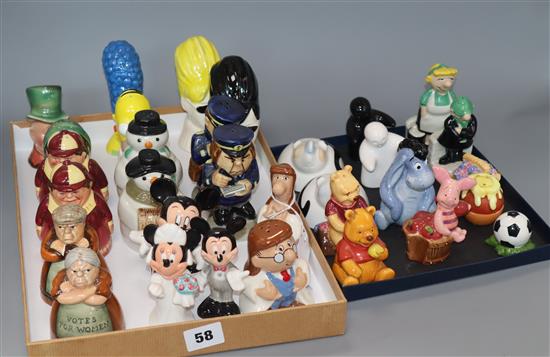 A collection of novelty salt and pepper pots, including Disney characters